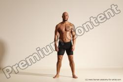 Underwear Gymnastic poses Man Black Muscular Bald Dancing Dynamic poses Academic